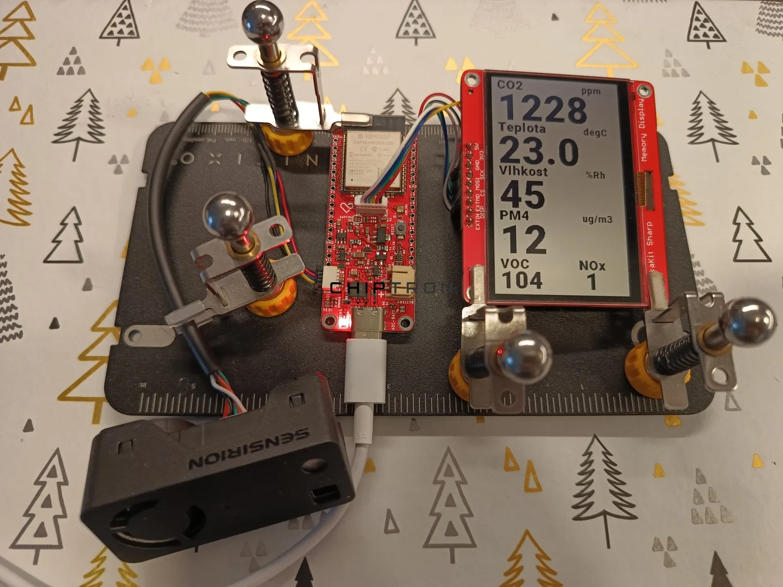 SEN66 module connected to an ESP32, displaying measured air-quality readings