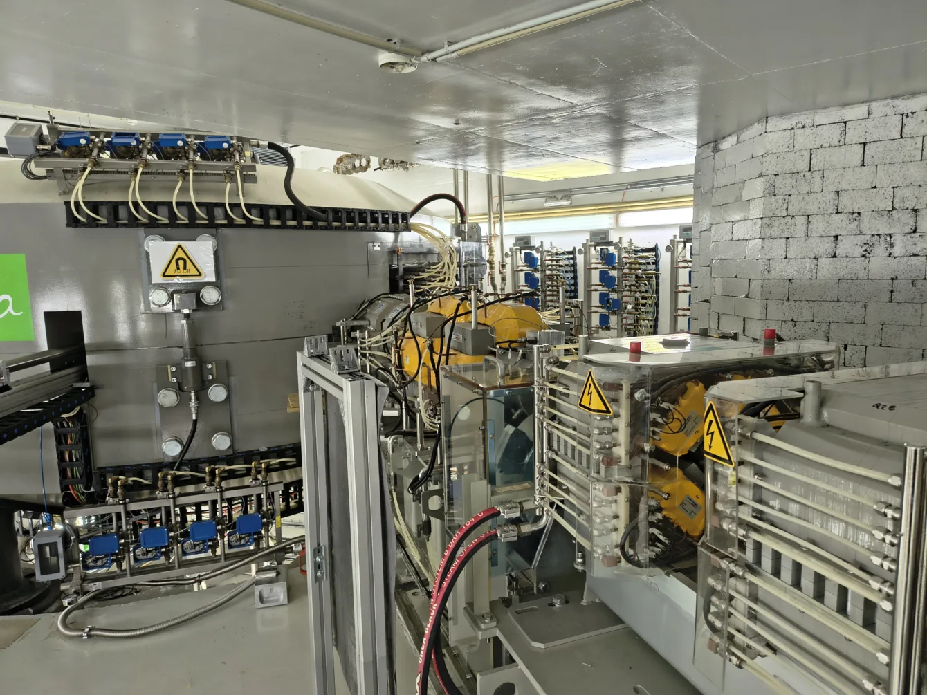 Cyclotron from another side. The proton beam is continuously monitored - its size and energy.