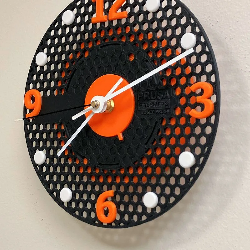 Wall clock with simulated filament winding